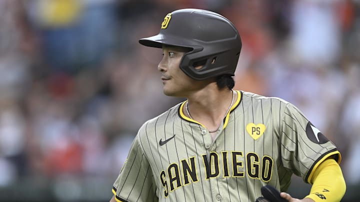 Jul 26, 2024; Baltimore, Maryland, USA;  San Diego Padres shortstop Ha-Seong Kim (7) walks to the dugout during the game against the Baltimore Orioles at Oriole Park at Camden Yards. Mandatory Credit: Tommy Gilligan-Imagn Images