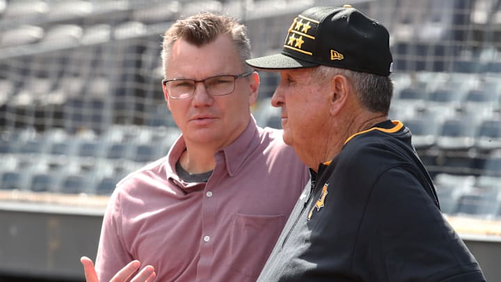 May 19, 2025; Pittsburgh, Pennsylvania, USA;  Pittsburgh Pirates general manager Ben Cherington (left) and special advisor Gene Lamont (right) talk on the field before the game against the Cincinnati Reds at PNC Park. Mandatory Credit: Charles LeClaire-Imagn Images