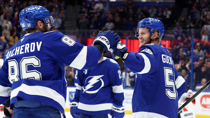 Nov 18, 2025; Tampa, Florida, USA; Tampa Bay Lightning center Jake Guentzel (59) is congratulated after he scores a goal for a hat trick against the New Jersey Devils during the third period at Benchmark International Arena. Mandatory Credit: Kim Klement Neitzel-Imagn Images Nov 18, 2025; Tampa, Florida, USA; Tampa Bay Lightning center Jake Guentzel (59) is congratulated after he scores a goal for a hat trick against the New Jersey Devils during the third period at Benchmark International Arena. Mandatory Credit: Kim Klement Neitzel-Imagn Images