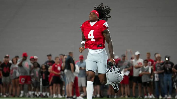Ohio State Buckeyes wide receiver Jeremiah Smith (4) takes the field for football training camp inside the Woody Hayes Athletic Center in Columbus on Aug. 7, 2026.