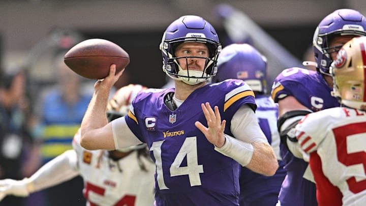 Sep 15, 2024; Minneapolis, Minnesota, USA; Minnesota Vikings quarterback Sam Darnold (14) in action against the San Francisco 49ers during the game at U.S. Bank Stadium. Sep 15, 2024; Minneapolis, Minnesota, USA; Minnesota Vikings quarterback Sam Darnold (14) in action against the San Francisco 49ers during the game at U.S. Bank Stadium.