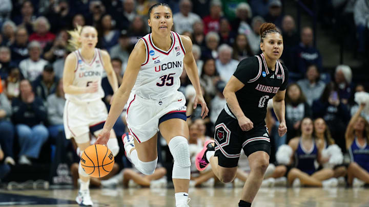 Mar 22, 2025; Storrs, Connecticut, USA; UConn Huskies guard Azzi Fudd (35) returns the ball against Arkansas State Red Wolves guard Shaunae Brown (0) in the first half at Harry A. Gampel Pavilion. Mandatory Credit: David Butler II-Imagn Images Mar 22, 2025; Storrs, Connecticut, USA; UConn Huskies guard Azzi Fudd (35) returns the ball against Arkansas State Red Wolves guard Shaunae Brown (0) in the first half at Harry A. Gampel Pavilion. Mandatory Credit: David Butler II-Imagn Images