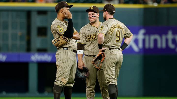 Sep 14, 2026; Denver, Colorado, USA; San Diego Padres shortstop Xander Bogaerts (2) and first baseman Ty France (25) and second baseman Jake Cronenworth (9) in the fifth inning against the Colorado Rockies at Coors Field. Mandatory Credit: Isaiah J. Downing-Imagn Images Sep 14, 2026; Denver, Colorado, USA; San Diego Padres shortstop Xander Bogaerts (2) and first baseman Ty France (25) and second baseman Jake Cronenworth (9) in the fifth inning against the Colorado Rockies at Coors Field. Mandatory Credit: Isaiah J. Downing-Imagn Images