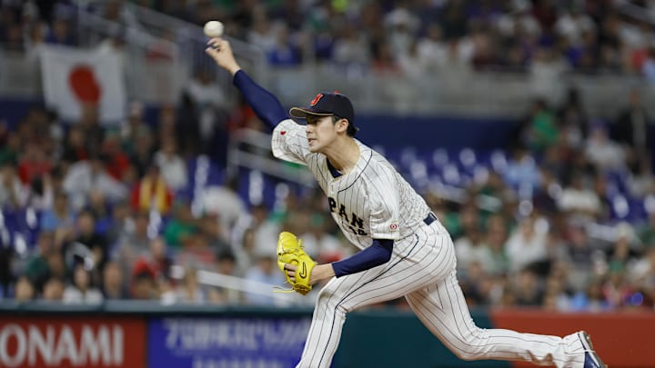 Mar 20, 2023; Miami, Florida, USA; Japan starting pitcher Roki Sasaki (14) delivers a pitch during the first inning against Mexico at LoanDepot Park. Mar 20, 2023; Miami, Florida, USA; Japan starting pitcher Roki Sasaki (14) delivers a pitch during the first inning against Mexico at LoanDepot Park.