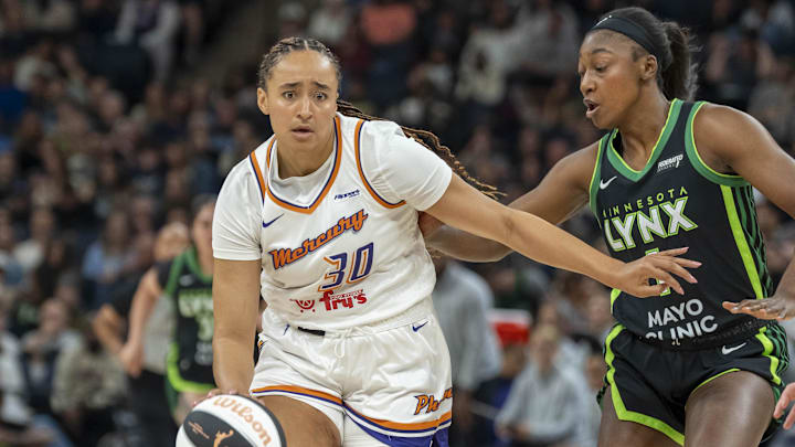 Jun 3, 2025; Minneapolis, Minnesota, USA; Phoenix Mercury guard Haley Jones (30) dribbles the ball as Minnesota Lynx forward Diamond Miller (1) plays defense in the second half at Target Center. Mandatory Credit: Jesse Johnson-Imagn Images Jun 3, 2025; Minneapolis, Minnesota, USA; Phoenix Mercury guard Haley Jones (30) dribbles the ball as Minnesota Lynx forward Diamond Miller (1) plays defense in the second half at Target Center. Mandatory Credit: Jesse Johnson-Imagn Images