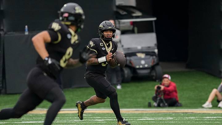 Oct 3, 2026; Winston-Salem, North Carolina, USA;  Wake Forest Demon Deacons quarterback Gio Lopez (3) looks to pass to wide receiver Carlos Hernandez (8) during the first half against the Stanford Cardinal at Allegacy Federal Credit Union Stadium.  Mandatory Credit: Jim Dedmon-Imagn Images