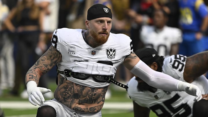 Las Vegas Raiders defensive end Maxx Crosby (98) stretches during pregame warmups before an NFL game against the Los Angeles Rams at SoFi Stadium.