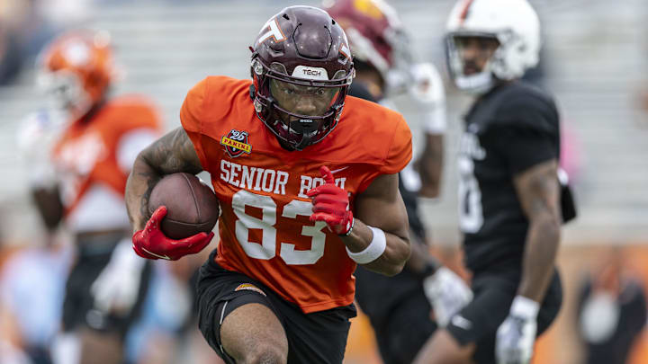 Jan 30, 2025; Mobile, AL, USA; National team wide receiver Jaylin Lane of Virginia Tech (83) works through drills during Senior Bowl practice for the National team at Hancock Whitney Stadium. Mandatory Credit: Vasha Hunt-Imagn Images