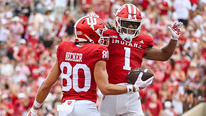 Sep 12, 2026; Bloomington, Indiana, USA; Indiana Hoosiers wide receiver Charlie Becker (80) celebrates with Indiana Hoosiers running back Turbo Richard (1) after a touchdown against the Howard Bison during the first half at Merchants Bank Field at Memorial Stadium. Mandatory Credit: Robert Goddin-Imagn Images Sep 12, 2026; Bloomington, Indiana, USA; Indiana Hoosiers wide receiver Charlie Becker (80) celebrates with Indiana Hoosiers running back Turbo Richard (1) after a touchdown against the Howard Bison during the first half at Merchants Bank Field at Memorial Stadium. Mandatory Credit: Robert Goddin-Imagn Images