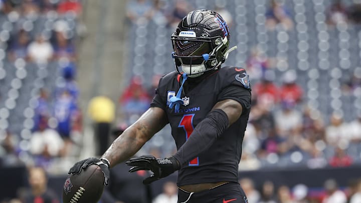 Oct 6, 2024; Houston, Texas, USA; Houston Texans wide receiver Stefon Diggs (1) warms up before the game against the Buffalo Bills at NRG Stadium.
