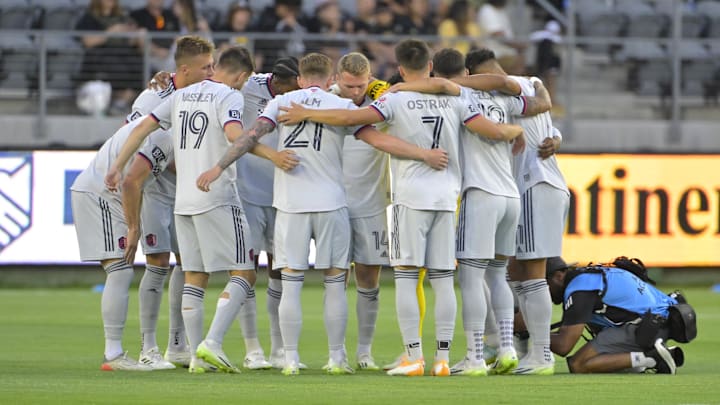 St. Louis City players huddle before a game Wednesday in Los Angeles. The expansion side lost 3-0 to defending MLS champions LAFC.