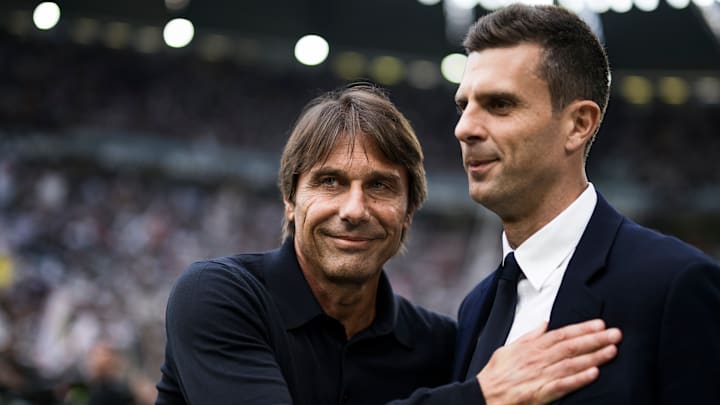 Antonio Conte (L), head coach of SSC Napoli, and Thiago...