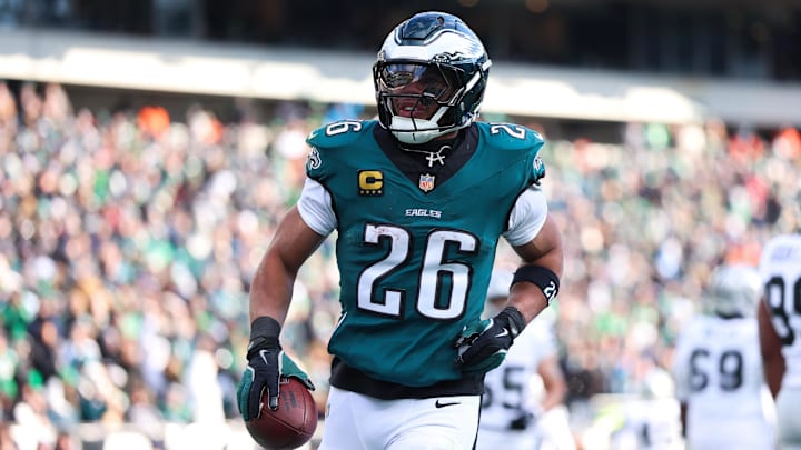 Dec 14, 2025; Philadelphia, Pennsylvania, USA; Philadelphia Eagles running back Saquon Barkley (26) reacts after scoring a touchdown against the Las Vegas Raiders during the second quarter at Lincoln Financial Field. Mandatory Credit: Bill Streicher-Imagn Images