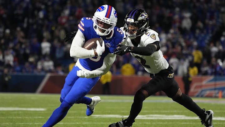 Sep 7, 2025; Orchard Park, New York, USA; Buffalo Bills wide receiver Joshua Palmer (5) runs the ball against Baltimore Ravens cornerback Nate Wiggins (2) during the fourth quarter at Highmark Stadium. Mandatory Credit: Gregory Fisher-Imagn Images Sep 7, 2025; Orchard Park, New York, USA; Buffalo Bills wide receiver Joshua Palmer (5) runs the ball against Baltimore Ravens cornerback Nate Wiggins (2) during the fourth quarter at Highmark Stadium. Mandatory Credit: Gregory Fisher-Imagn Images