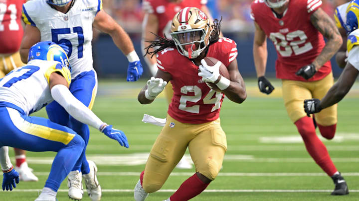 Sep 22, 2024; Inglewood, California, USA;  San Francisco 49ers running back Jordan Mason (24) carries the ball in the second half against the Los Angeles Rams at SoFi Stadium. Mandatory Credit: Jayne Kamin-Oncea-Imagn Images