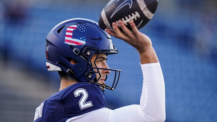 Nov 8, 2025; East Hartford, Connecticut, USA; UConn Huskies quarterback Joe Fagnano (2) warms up before the start of the game against the Duke Blue Devils at Pratt & Whitney Stadium at Rentschler Field. Mandatory Credit: David Butler II-Imagn Images