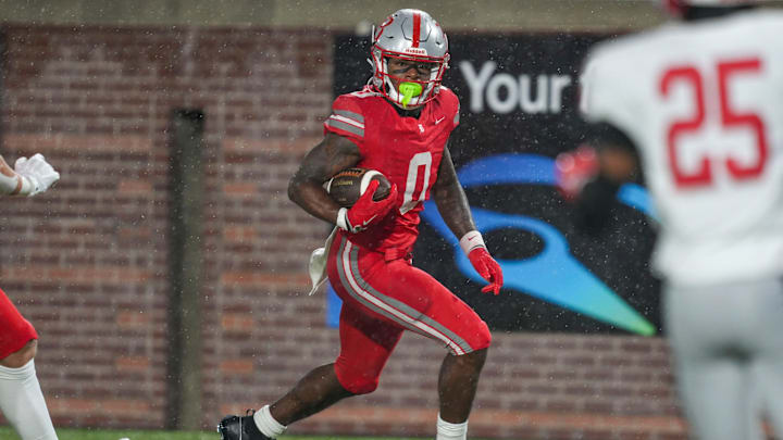 Baylor's David Gabriel Georges (0) carries the ball in the end zone for a touchdown during the Division II-AAA championship game at Finley Stadium in Chattanooga, Tenn., on Dec. 4, 2025.