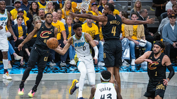 May 9, 2025; Indianapolis, Indiana, USA; Indiana Pacers guard Tyrese Haliburton (0) passes the ball while Cleveland Cavaliers forward Evan Mobley (4) defends during game three of the second round for the 2025 NBA Playoffs at Gainbridge Fieldhouse. Mandatory Credit: Trevor Ruszkowski-Imagn Images May 9, 2025; Indianapolis, Indiana, USA; Indiana Pacers guard Tyrese Haliburton (0) passes the ball while Cleveland Cavaliers forward Evan Mobley (4) defends during game three of the second round for the 2025 NBA Playoffs at Gainbridge Fieldhouse. Mandatory Credit: Trevor Ruszkowski-Imagn Images