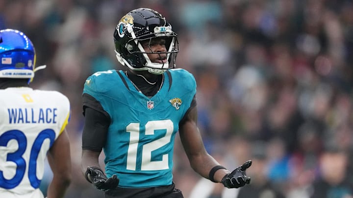 Oct 19, 2025; London, United Kingdom; Jacksonville Jaguars wide receiver Travis Hunter (12) reacts after a play against the Los Angeles Rams during the second half of an NFL International Series game at Wembley Stadium. Mandatory Credit: Kirby Lee-Imagn Images