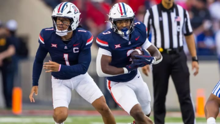Kedrick Reescano running downfield with Noah Fifita behind him. Kedrick Reescano running downfield with Noah Fifita behind him.