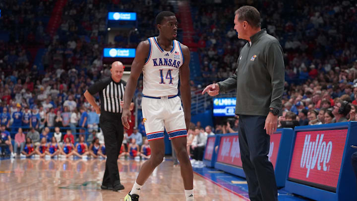 Kansas Jayhawks guard Melvin Council Jr. (14) talks to Kansas Jayhawks head coach Bill Self during the second half of the exhibition game against Fort Hays State Tigers inside Allen Fieldhouse on Tuesday, October, 28, 2025. Kansas Jayhawks guard Melvin Council Jr. (14) talks to Kansas Jayhawks head coach Bill Self during the second half of the exhibition game against Fort Hays State Tigers inside Allen Fieldhouse on Tuesday, October, 28, 2025.