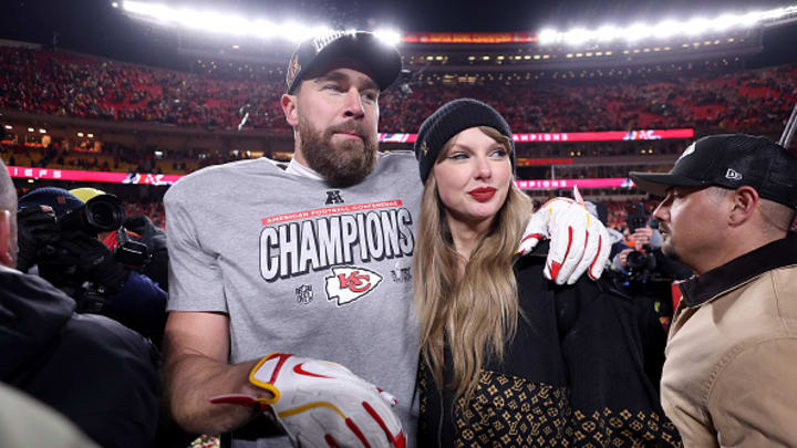 Taylor Swift celebrates with Travis Kelce #87 of the Kansas City Chiefs after defeating the Buffalo Bills 32-29 in the AFC Championship Game at GEHA Field at Arrowhead Stadium on January 26, 2025 in Kansas City, Missouri.