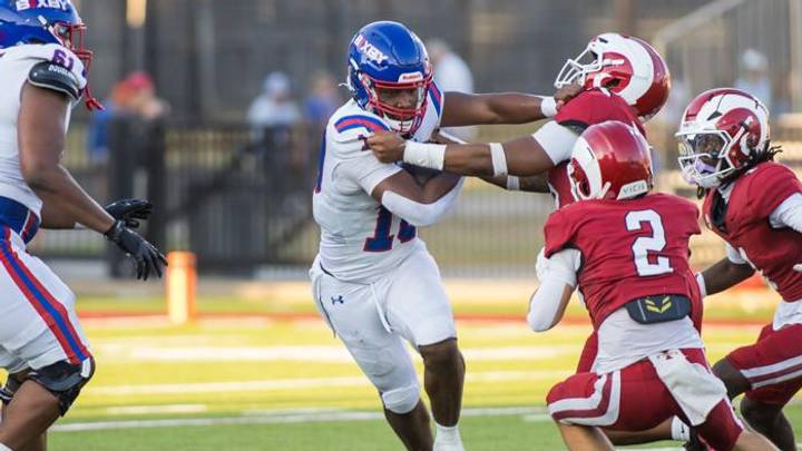 Bixby quarterback Isaiah "Q" Butcher accounted for 4 total touchdowns in the Spartans' season-opening win at Owasso on Aug. 28, 2026. Bixby quarterback Isaiah "Q" Butcher accounted for 4 total touchdowns in the Spartans' season-opening win at Owasso on Aug. 28, 2026.