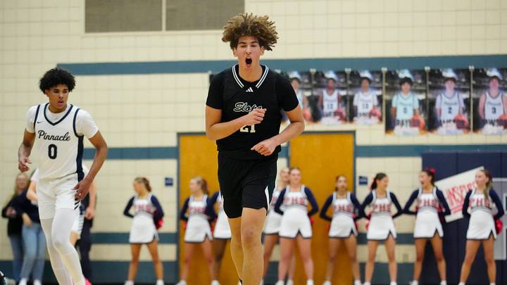 Sunnyslope center Darius Wabbington (21) yells after hitting a three-pointer against Pinnacle during a game at Pinnacle High School in Phoenix on Jan. 12, 2024. Sunnyslope center Darius Wabbington (21) yells after hitting a three-pointer against Pinnacle during a game at Pinnacle High School in Phoenix on Jan. 12, 2024.