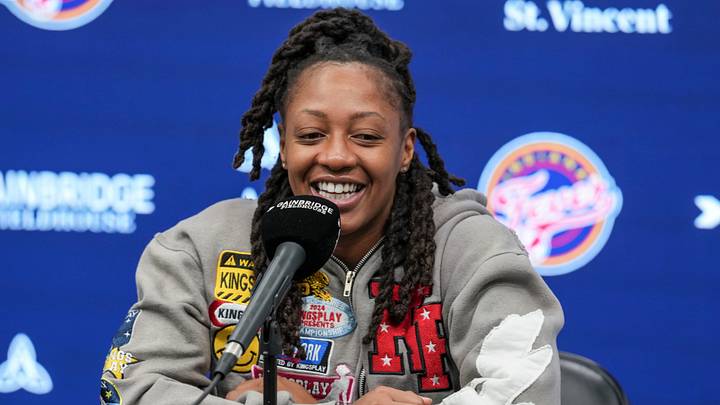 Indiana Fever guard Kelsey Mitchell (0) smiles Saturday, Oct. 3, 2026, during exit interviews at Gainbridge Fieldhouse in Indianapolis after the 2026 WNBA season.