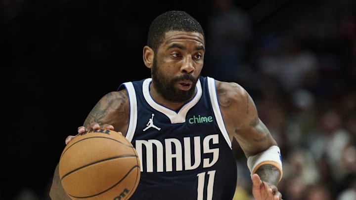 Dec 28, 2024; Portland, Oregon, USA; Dallas Mavericks guard Kyrie Irving (11) drives to the basket during the first half against Portland Trail Blazers guard Shaedon Sharpe (17) at Moda Center. Mandatory Credit: Troy Wayrynen-Imagn Images