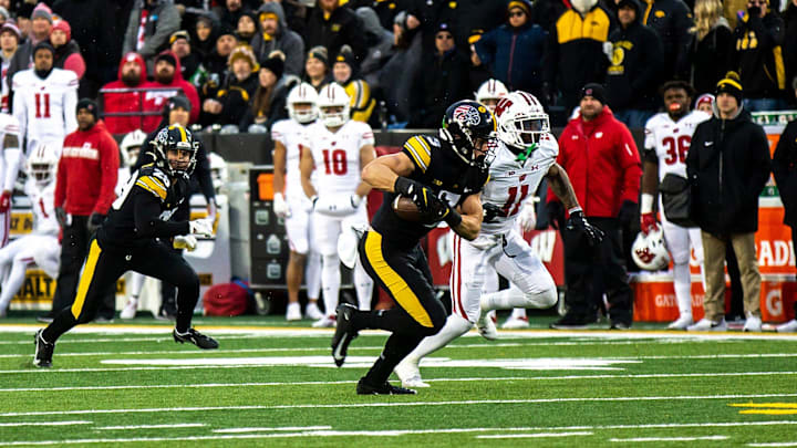 Cooper DeJean returns an interception for a touchdown against Wisconsin.