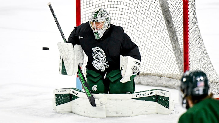 Michigan State's Trey Augustine blocks the puck during hockey practice on Thursday, Sept. 25, 2025, at Munn Arena in East Lansing.