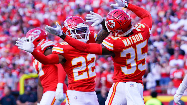 Sep 15, 2024; Kansas City, Missouri, USA; Kansas City Chiefs cornerback Trent McDuffie (22) celebrates with cornerback Jaylen Watson (35) after a play against the Cincinnati Bengals during the first half at GEHA Field at Arrowhead Stadium. Mandatory Credit: Denny Medley-Imagn Images