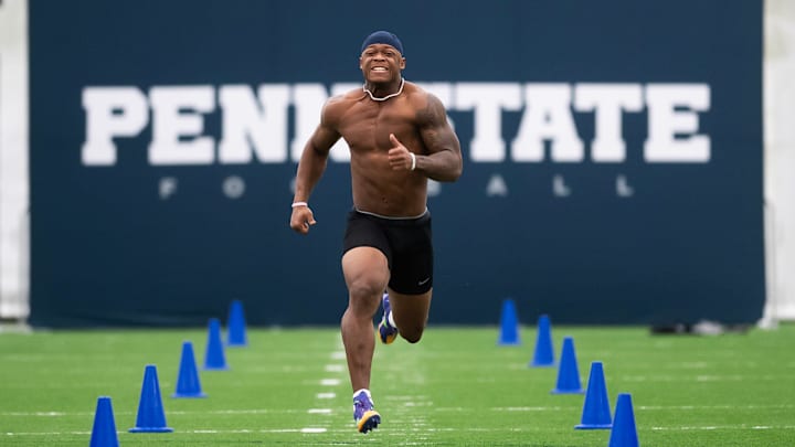 Former Penn State linebacker Kobe King runs the 40-yard dash during Penn State's Pro Day in Holuba Hall. 