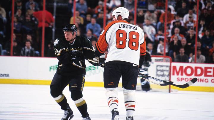 Mar 14, 1999; Philadelphia, PA, USA; FILE PHOTO; Dallas Stars center Tony Hrkac (41) in action against Philadelphia Flyers center Eric Lindros (88) at the First Union Center. Mandatory Credit: Lou Capozzola-USA TODAY NETWORK