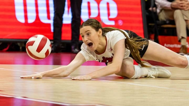 Bergen Reilly gets the pancake to add to her dig total vs. the Minnesota Golden Gophers inside the Bob Devaney Sports Center