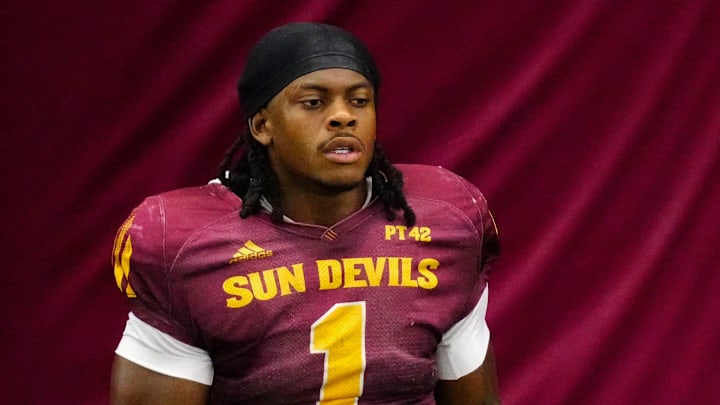 Arizona State running backs Kyson Brown (1) and Raleek Brown (3) take a water break during a practice inside the Verde Dickey Dome in Tempe on August 12, 2025.