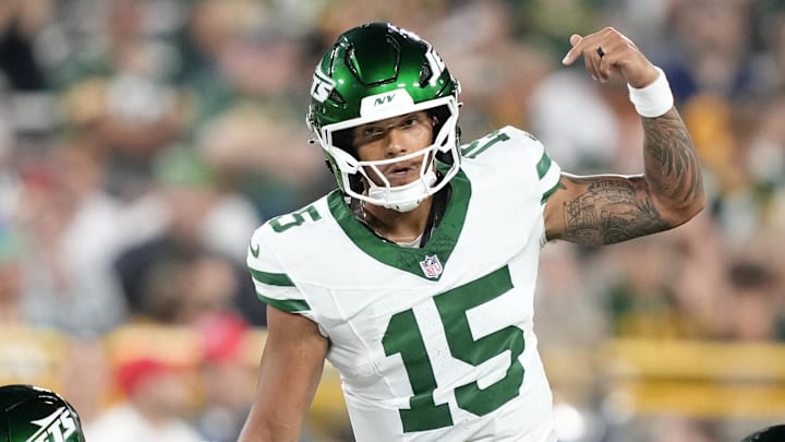 Aug 9, 2025; Green Bay, Wisconsin, USA; New York Jets quarterback Adrian Martinez (15) calls a play during the second half against the Green Bay Packers at Lambeau Field. Aug 9, 2025; Green Bay, Wisconsin, USA; New York Jets quarterback Adrian Martinez (15) calls a play during the second half against the Green Bay Packers at Lambeau Field.