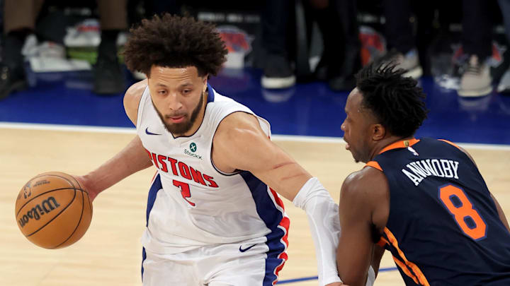 Apr 21, 2025; New York, New York, USA; Detroit Pistons guard Cade Cunningham (2) controls the ball against New York Knicks forward OG Anunoby (8) during the fourth quarter of game two of the first round of the 2024 NBA Playoffs at Madison Square Garden. Mandatory Credit: Brad Penner-Imagn Images