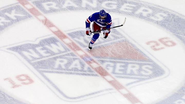 May 22, 2014; New York, NY, USA; New York Rangers left wing Rick Nash skates across the center ice logo before game three of the Eastern Conference Final of the 2014 Stanley Cup Playoffs against the Montreal Canadiens at Madison Square Garden. Mandatory Credit: Ed Mulholland-Imagn Images