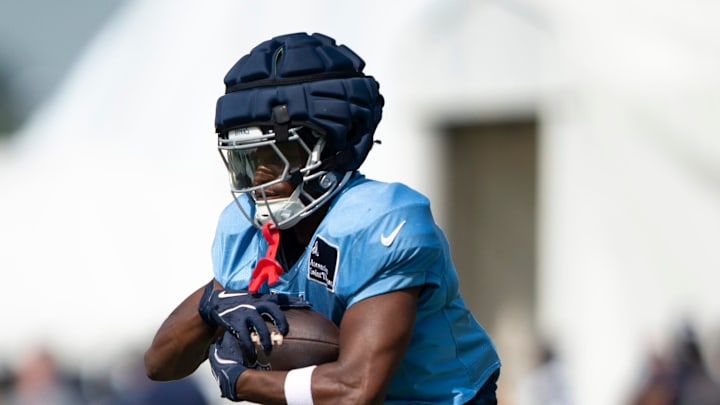 Tennessee Titans running back Jabari Small (31) runs drills at Ascension Saint Thomas Sports Park in Nashville, Tenn., Thursday, Aug. 15, 2024. This is the second day of the Titans joint practice with the Seattle Seahawks.