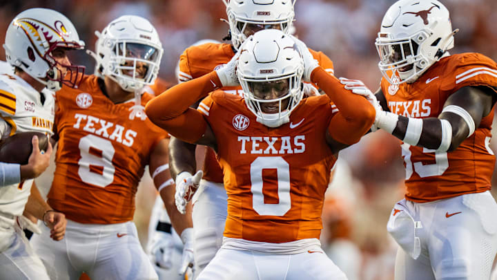Sep 21, 2024; Austin, Texas, USA; Texas Longhorns linebacker Anthony Hill Jr. (0) celebrates sacking Louisiana Monroe Warhawks quarterback General Booty (14) in the first half of the Texas Longhorns' game against the ULM Warhawks at Darrell K Royal Texas Memorial Stadium. Mandatory Credit: Sara Diggins-Imagn Images