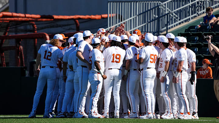 The Texas Longhorns huddle on the field aheaed of the annual Texas baseball alumni game at UFCU Disch-Falk Field on Saturday, Feb. 1, 2025.