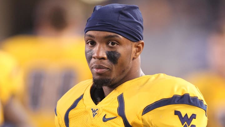 December 1, 2012; Morgantown, WV, USA; West Virginia Mountaineers wide receiver Tavon Austin (1) looks on from the sidelines against the Kansas Jayhawks during the fourth quarter at Milan Puskar Stadium. The West Virginia Mountaineers won 59-10. Mandatory Credit: Charles LeClaire-Imagn Images