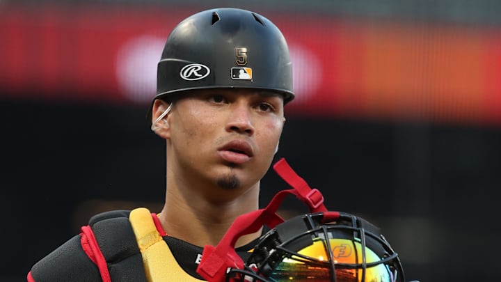 Jun 4, 2025; Pittsburgh, Pennsylvania, USA;  Pittsburgh Pirates catcher Endy Rodriguez (5) looks on from behind the plate against the Houston Astros during the fifth inning at PNC Park. Mandatory Credit: Charles LeClaire-Imagn Images