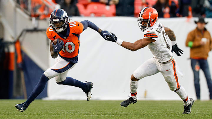 Nov 26, 2023; Denver, Colorado, USA; Denver Broncos wide receiver Jerry Jeudy (10) runs the ball against Cleveland Browns cornerback Greg Newsome II (0) in the third quarter at Empower Field at Mile High. Mandatory Credit: Isaiah J. Downing-USA TODAY Sports Nov 26, 2023; Denver, Colorado, USA; Denver Broncos wide receiver Jerry Jeudy (10) runs the ball against Cleveland Browns cornerback Greg Newsome II (0) in the third quarter at Empower Field at Mile High. Mandatory Credit: Isaiah J. Downing-USA TODAY Sports