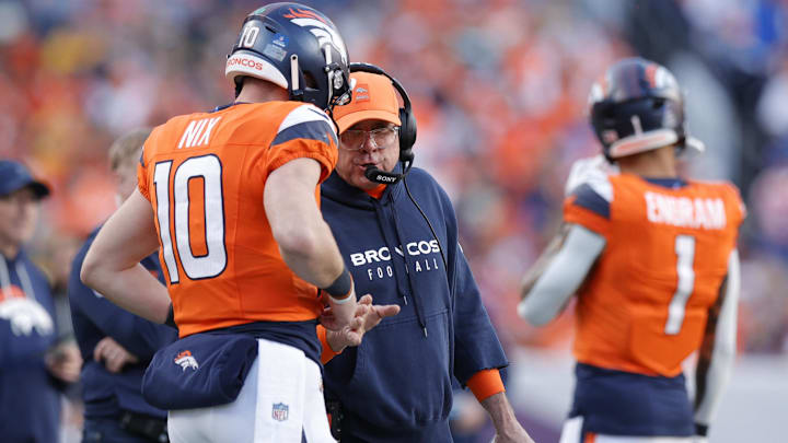 Dec 14, 2025; Denver, Colorado, USA; Denver Broncos head coach Sean Payton talks with quarterback Bo Nix (10) during the second quarter against the Green Bay Packers at Empower Field at Mile High. Dec 14, 2025; Denver, Colorado, USA; Denver Broncos head coach Sean Payton talks with quarterback Bo Nix (10) during the second quarter against the Green Bay Packers at Empower Field at Mile High.