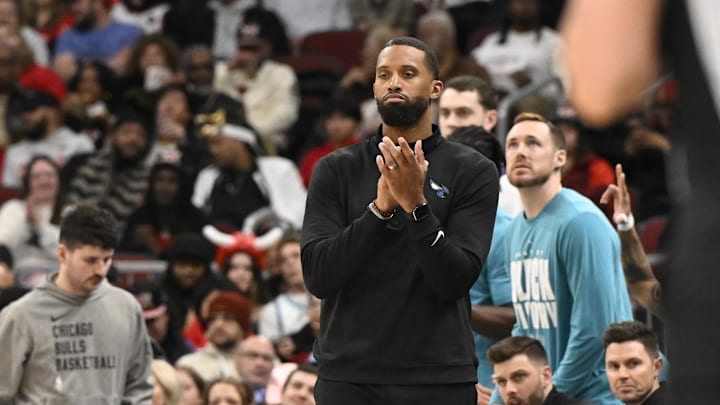 Charlotte Hornets head coach Charles Lee claps during the first half against the Chicago Bulls Charlotte Hornets head coach Charles Lee claps during the first half against the Chicago Bulls