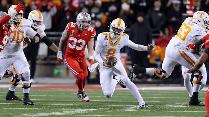 Dec 21, 2024; Columbus, Ohio, USA; Tennessee Volunteers quarterback Nico Iamaleava (8) runs the ball during the third quarter against the Ohio State Buckeyes at Ohio Stadium. Mandatory Credit: Joseph Maiorana-Imagn Images Dec 21, 2024; Columbus, Ohio, USA; Tennessee Volunteers quarterback Nico Iamaleava (8) runs the ball during the third quarter against the Ohio State Buckeyes at Ohio Stadium. Mandatory Credit: Joseph Maiorana-Imagn Images