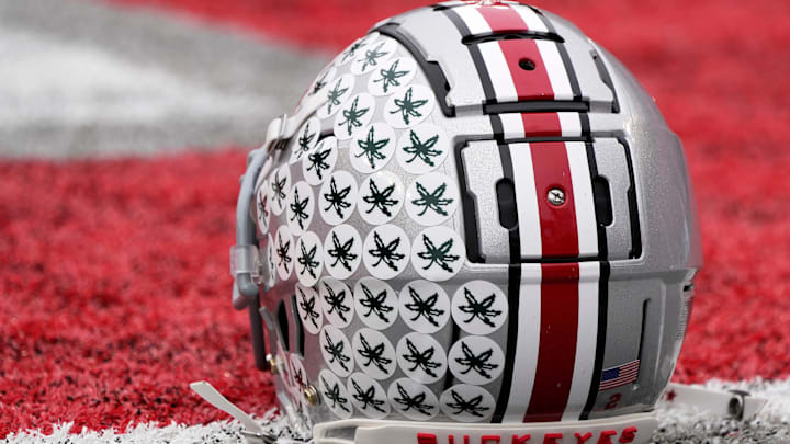 Oct. 1, 2022; Columbus, Ohio, USA; A stick-ladden Ohio State Buckeyes helmet sits on the turf during warmups before Saturday's game against the Rutgers Scarlet Knights in Columbus. Mandatory Credit: Barbara Perenic/Columbus Dispatch
Sports Ohio State Rutgers Ncaa Football Oct. 1, 2022; Columbus, Ohio, USA; A stick-ladden Ohio State Buckeyes helmet sits on the turf during warmups before Saturday's game against the Rutgers Scarlet Knights in Columbus. Mandatory Credit: Barbara Perenic/Columbus Dispatch
Sports Ohio State Rutgers Ncaa Football